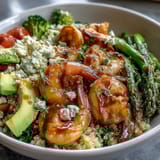 Colorful red cabbage, diced tomato, and creamy avocado slices complete this vibrant Rainbow Vegetable Detox Bowl.