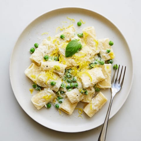 Freshly grated Parmesan and zesty lemon juice brighten this spring-inspired Pea & Lemon Ricotta Pasta.  